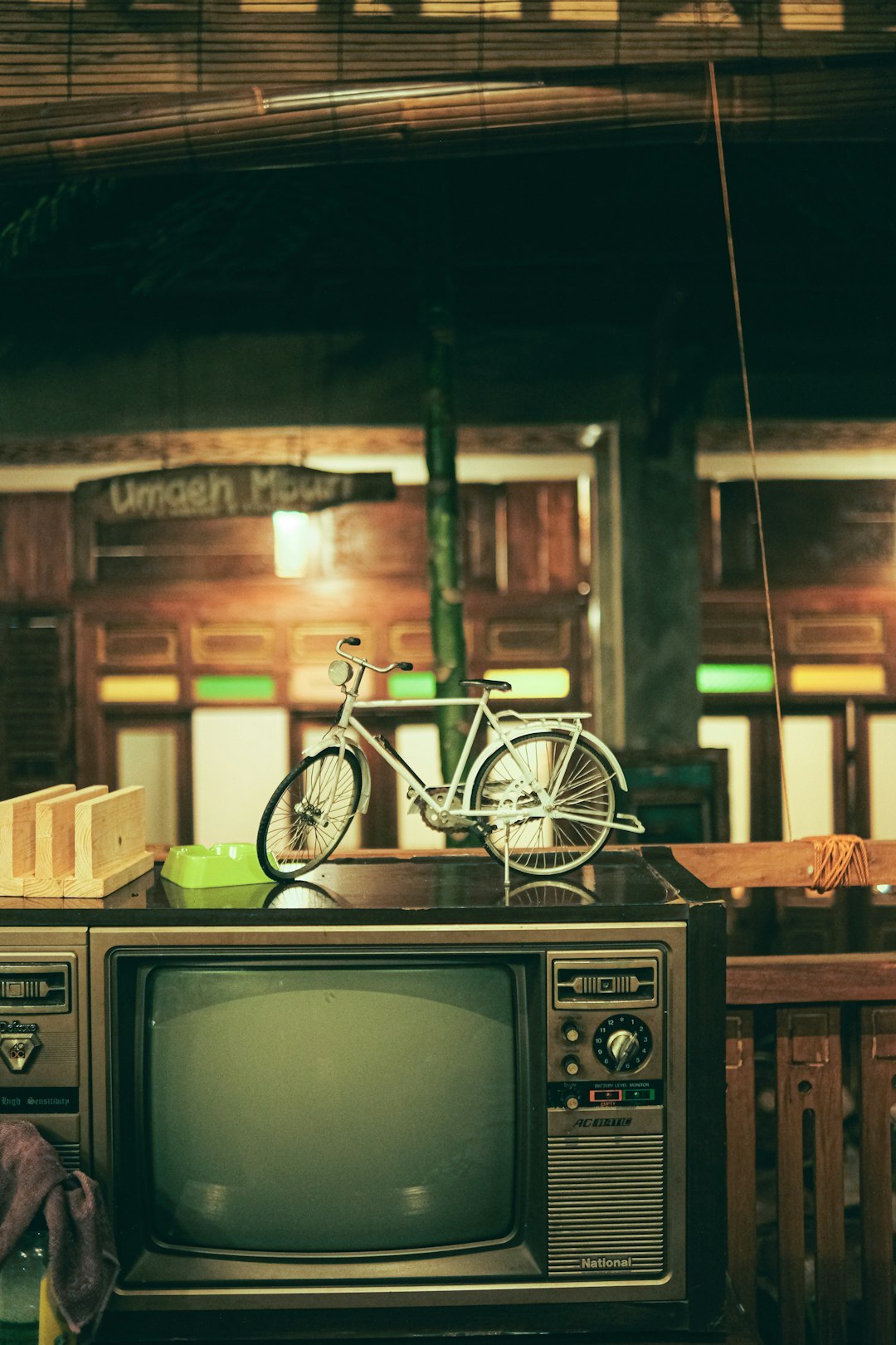 Vintage television studio with old broadcast camera and warm stage lights